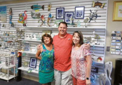 Kaleidoscope Consignments owner Time Lowell with Manager Karen Patterson (right) and Sales Associate Linda (left). Photo by Mike Winikoff.